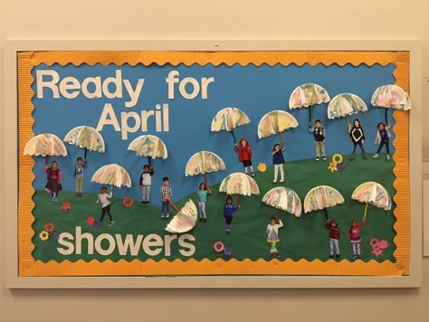 Ready for April showers! Umbrellas made out of small paper plates and dripping watercolor paint April Showers Art Project, April Art Kindergarten, April Showers Bulletin Board Ideas, April Cubby Tags, April Showers Crafts For Toddlers, Pre K Spring Bulletin Boards, April Showers Bring May Flowers Bulletin Board, Umbrella Bulletin Board Ideas, April Board Ideas