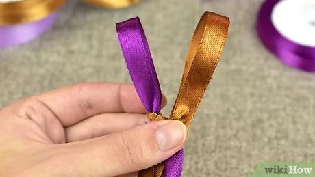 How to Make Ribbon Leis: 14 Steps (with Pictures) - wikiHow Ribbon Leis Diy Tutorials Easy, Easy Ribbon Leis For Graduation, Ribbon Lays For Graduation, Graduation Ribbon Leis How To Make, Graduation Leis Diy Ribbons How To Make, How To Make Graduation Leis Tutorials, Easy Leis For Graduation, How To Make Graduation Leis, Grad Leis Diy