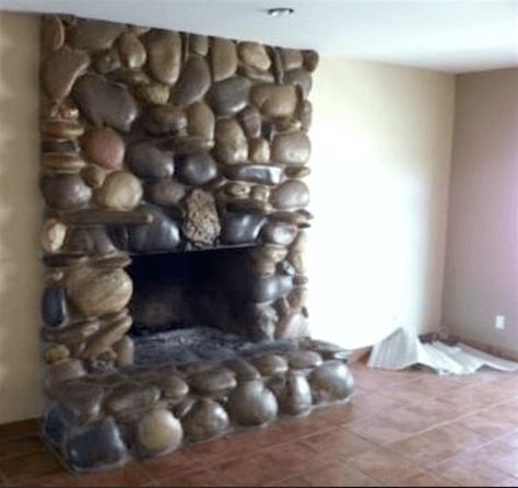 Share Tweet Pin Mail   Last Sunday we explored ugly brick fireplaces and today, we’re going to have a look at the ugly stone ... Painted River Rock Fireplace, Old Rock Fireplace Makeover, Update Stone Fireplace, River Rock Fireplace Makeover, Rock Fireplace Ideas, Rock Fireplace Makeover, River Stone Fireplace, Fireplace Cover Up, Stone Fireplace Mantle