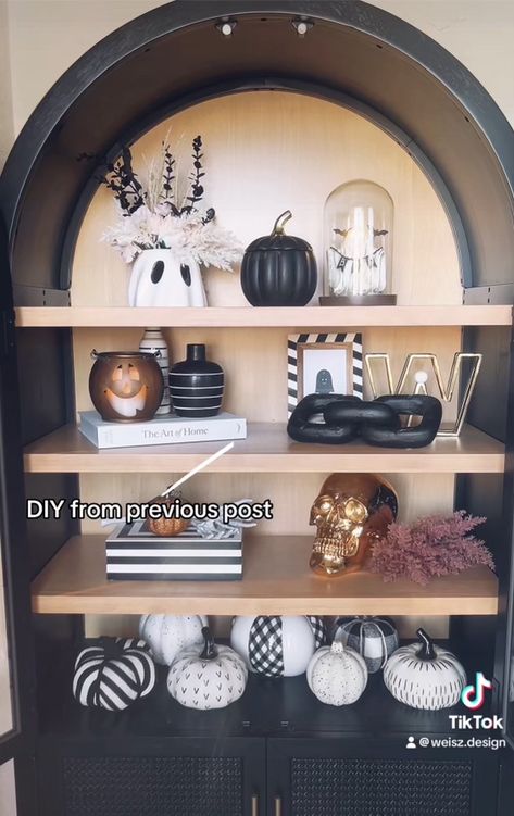 Fall decor, fall bookshelf styling, fall bookshelf decor, Halloween decor, Halloween bookshelf decor, Halloween bookshelf styling  Follow my shop @Staged2Shine on the @shop.LTK app to shop this post and get my exclusive app-only content!  #liketkit #LTKSeasonal #LTKhome @shop.ltk https://liketk.it/4RtuM Bookshelf Halloween Decor, Black Bookshelves Aesthetic, Halloween Bookshelf, Halloween Bookshelf Decor, Fall Bookshelf Decor, Built In Shelf Decor, Black Bookshelves, Fall Bookshelf, Bookshelves Aesthetic