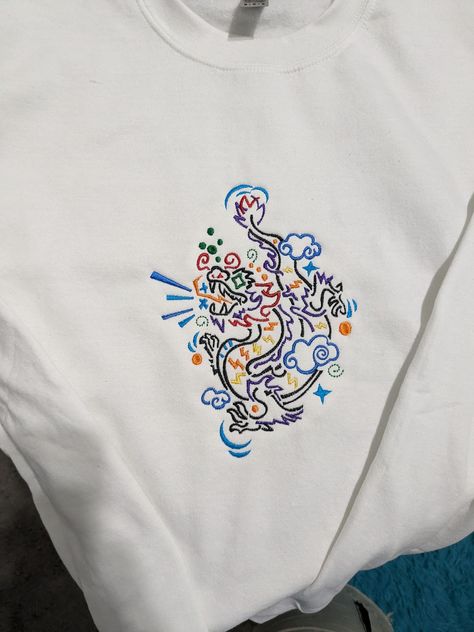 Excited to share the latest addition to my #etsy shop: Dragon Embroidered Sweatshirt, Cotton Polyester Blend https://etsy.me/42Soqid #white #whitetop #sweatshirt #cottonpolyester #embroidery #embroideredapparel #giftforhim #giftforher #chinesedragon Embroidery Characters, Toothless Embroidery, Dragon Embroidery, Dragon Shirt, Dragon Embroidery Simple, Toothless Dragon Embroidery, Dragon Embroidery Dress, Embroidered Pokemon, Cute Dragon Embroidery