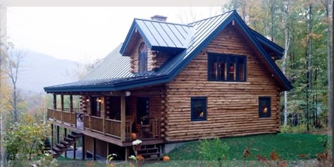 beautiful home with metal roof in blue Blue Metal Roof, Hip Roof House Plans, Cabin Porches, Cabin Exteriors, Log Homes Exterior, Log Cabin Exterior, Log Home Builders, Home Siding, Log Cabin Living