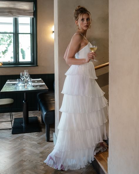 A wedding dress made for dancing...⁠ ⁠ ⁠ If you’re looking forward to your wedding evening party, and tearing up the dance floor to your favourite tunes, you’ll want to wear a dress that you can 𝘢𝘤𝘵𝘶𝘢𝘭𝘭𝘺 dance in. ⁠ ⁠ ⁠ SAINT, from Kent based bridal designer @storyofmydressbridal features a textural floaty ruffle-tiered skirt, perfect for dancing in all. night. long. ⁠ ⁠ ⁠ With a subtle nod to the Traje de flamenca (the Spanish flamenco dress), SAINT is a flirty, playful, romantic number, ful... Spanish Flamenco, Wedding Evening Party, Flamenco Dress, A Wedding Dress, Bridal Designs, The Dance, Tiered Skirt, Dance Floor, Evening Party