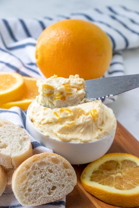 This Orange Butter recipe is a sweet and tangy citrus-infused compound butter made with only two ingredients - butter and orange juice! It's delicious and versatile - spread it over baked goods like muffins and scones, or use it in savory dishes as a glaze or sauce! Orange Compound Butter, Savory Citrus Recipes, Butter Themed Party, Sweet Compound Butter Recipes, Infused Butter Recipe, Orange Butter Recipe, Breaky Ideas, Sweet Spreads, Citrus Butter