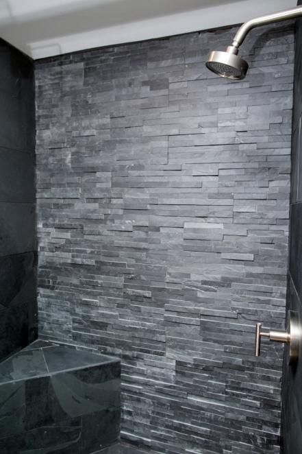 The new walk-in shower features seamless glass enclosure and dark gray stone tile similar to that used on the columns of the home's front exterior. Rock Shower Ideas, Stretching Tips, Fixer Upper Designs, Hgtv Fixer Upper, Stone Bathroom, Master Bathrooms, Bedroom Pictures, Lakefront Homes, Tile Inspiration