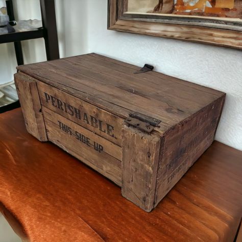 Very nice little wooden Storage box made of a fruit crate. Measures 20" by 14" by 10" and weighs approx 10 lbs. This piece would be a great addition to a garage, kitchen, garden, or anywhere else in the home you might need an extra container. Amazing gift for farm or cottage decor. Antique Wooden Boxes, Tiny Island, Garage Kitchen, Wooden Storage Box, Fruit Crate, Wooden Storage Boxes, A Fruit, Wooden Storage, Wooden Crate