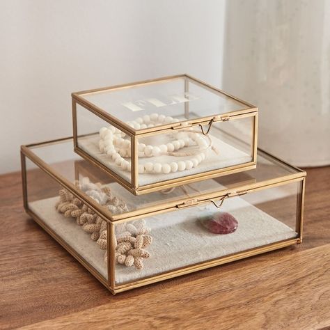 5 Ways to Decorate with Matchbooks | The Everygirl Glass Shadow Boxes, Jewelry Box Glass, Gold Glass Jewelry Case, Glass Jewelry Boxes Display, Jewelry Organization Aesthetic, Aesthetic Makeup Organization, Jewlerie Organization, Glass Box Decor, Jewlrey Organization