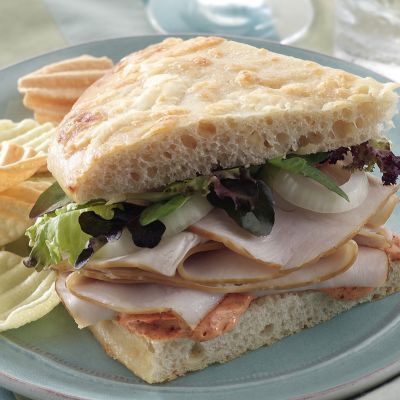 Copycat | Copycat Panera Bread Cafe's Sierra Turkey Sandwich Recipe | Recipe4Living Panera Sandwiches, Copycat Panera Bread, Turkey Sauce, Panera Recipes, Turkey Sandwiches Recipes, Copycat Panera, Turkey Sandwich, Turkey Recipes Thanksgiving, Panera Bread