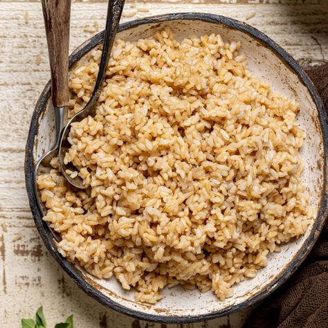 How to Cook Fluffy Brown Rice Brown Rice Cooking Instructions, How To Cook Brown Rice On The Stove, How To Make Brown Rice, Brown Rice In Microwave, How To Cook Brown Rice, Fluffy Brown Rice, Cooking Brown Rice, Cook Brown Rice, Perfect Brown Rice