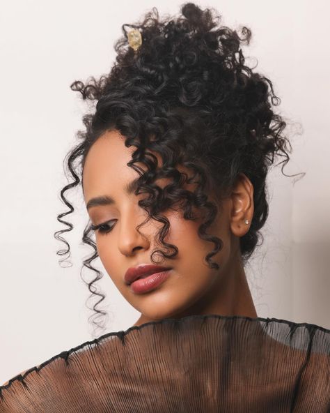 A textured updo on @kholoodofficial Makeup @megohareartistry #hairbynikirae @paulmitchellpro 3in1 curling iron @igk good behavior & please hold @tidalhairsticks #hairstylist #curlyhair #updohairstyles #updo Black Curly Wedding Hair, 3b Curly Hair Wedding Styles, Naturally Curly Updo Wedding, Natural Curly Hair Updo, Curly Bridal Hairstyles, Curly Hair Updo Wedding, Naturally Curly Updo, Curly Wedding Updo, Updo Natural Hair