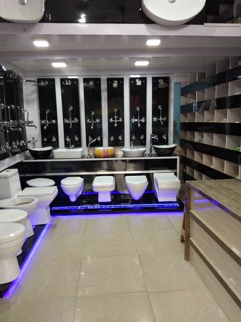 Plumbing Shop Interior Design, Sanitary Showroom Interiors, Paint Showroom, Interior Shop Display, Store Display Design, Shop Counter Design, Showroom Ideas, Fabric Store Design, Bedroom Wall Units