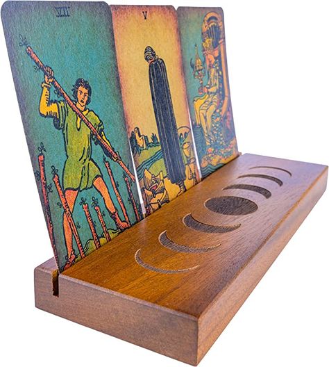 Amazon.com: Curawood Tarot Card Holder Stand - Display Your Daily 3 Card Draw - 9" Tarot Card Stand Display - Witchcraft Supplies, Tarot Accessories, Witchy Gifts, Pagan & Wiccan Altar Supplies, Divination Tools : Toys & Games Card Stand Display, Tarot Card Holder, Wicca Altar, Tarot Gifts, Pagan Crafts, Witchy Gifts, Daily 3, Reading Accessories, Happy Images