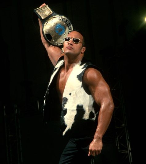 The Rock!! The People's Champ. The Bravo Bull, those names will sound familiar to the late nineties, to the early twenties years, when WWE was known as WWF, when the shows had attitude. as a teen, watching Smackdown, where all the people who were in charge of the business, were corrupt and evil, thinking no one had a chance who stayed on the hero's path, but the Rock did the People's hand to all of them and stood up for what he believed in, was a huge inspiration growing up. Still dose now. Wwf The Rock, Wwe Ring, Wwe The Rock, Wwe Figures, Wrestling Gear, Wwe Legends, Wwe World, Rock Johnson, The Rock Dwayne Johnson