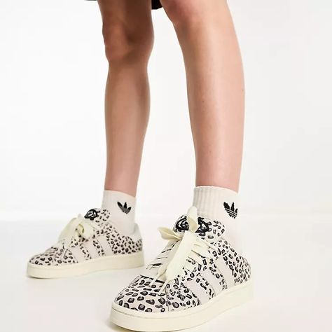 Looking for a statement shoe that will make you stand out from the crowds? Look no further than the Adidas Originals Campus 80s trainers in leopard print, available in a range of colors to suit all tastes. These shoes are perfect for adding some fierce flair to any outfit, whether you're headed to a music festival, hitting the dance floor, or just hanging out with friends. And with their comfortable fit and durable construction, they're sure to become your go-to kicks. So why settle for boring Leopard Print Adidas Shoes, Adidas Campus Leopard, 80s Trainers, How To Clean White Sneakers, Leopard Print Adidas, Most Comfortable Sneakers, Navy Trainers, Adidas Campus 00s, Diy Sneakers