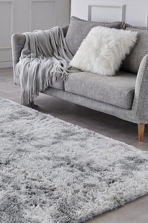 Charcoal Grey And Blue Living Room, Grey Rugs In Bedroom, Light Grey Rug Living Room, Rugs On Grey Wood Floors, Grey Rugs In Living Room, Light Grey Shaggy Rug, Grey Tiles Living Room, Grey Shag Rug, Gray Rug Living Room