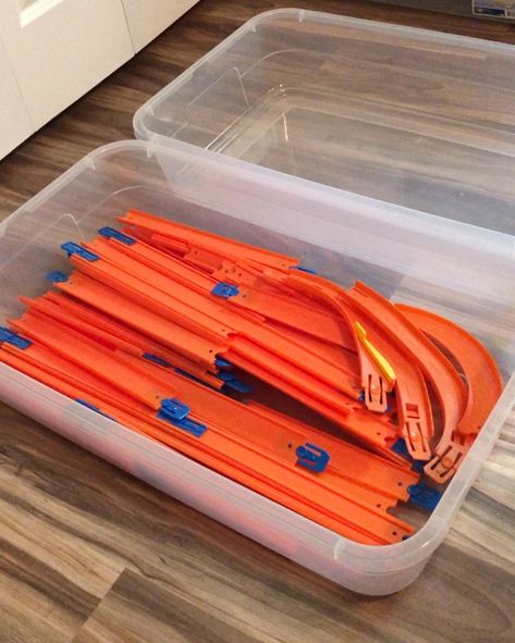 How To Neatly Store Hot Wheels Tracks - Organized-ish Hot Wheel Tracks Storage Ideas, Hot Wheels Under Bed Storage, Car Track Toy Storage, Organizing Hot Wheels Tracks, How To Organize Hot Wheels, Hotwheels Track Storage Ideas, Race Track Storage Ideas, Monster Jam Toy Storage, Hot Wheel Organization Storage Ideas