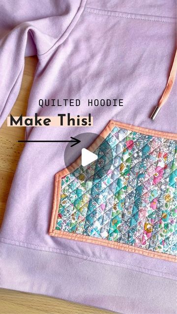 Amari Thomsen on Instagram: "Hello quilted hoodie in all your Liberty of London glory! 🤩 . Don’t throw your old hoodies away! Breathe new life into them with a quilted pocket! 🙌🏻 . #quiltedhoodie #diyfashion #quiltproject #sewingproject #igquiltcommunity #sewinghacks #sewingtime #quiltingismytherapy #libertyoflondon #reellove2024 #libertyoflondonfabric" Quilt Block Sweatshirt Diy, Sweatshirt Quilt How To Make A, Quilted Hoodie Diy, Diy Quilted Sweatshirt, Quilted Sweatshirt Diy, Quilt Square Sweatshirt, Sewing Clothing Ideas, Quilt Applique Sweatshirt, Sweatshirt Applique Diy Ideas