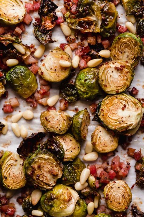 Maple Mustard Roasted Brussels Sprouts with Pancetta, Pine Nuts & Parmesan, the BEST roasted brussels sprouts recipe!!! Brussels sprouts tossed in a simple sauce made of maple syrup & two kinds of mustard with pancetta (italian bacon!) & roast til they’re perfectly caramelly & crispy. Served with pine nuts & parmesan, these roasted brussels sprouts are perfect for a holiday dinner & easy enough for weeknight dinners this fall & winter! #playswellwithbutter #roastedbrusselssprouts #roastedbrussel Italian Bacon, Brussels Sprouts With Pancetta, Italian Thanksgiving, Simple Sides, Pancetta Recipes, Brussel Sprout Recipes Roasted, Best Thanksgiving Side Dishes, Autumn Side Dishes, Maple Mustard