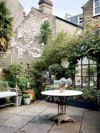 Phoebe Dickinson's house in south London | House & Garden Small City Garden, Townhouse Garden, Tattoo Plant, Brick Paving, London Garden, Small Courtyards, Garden Mirrors, London House, Terrace Design