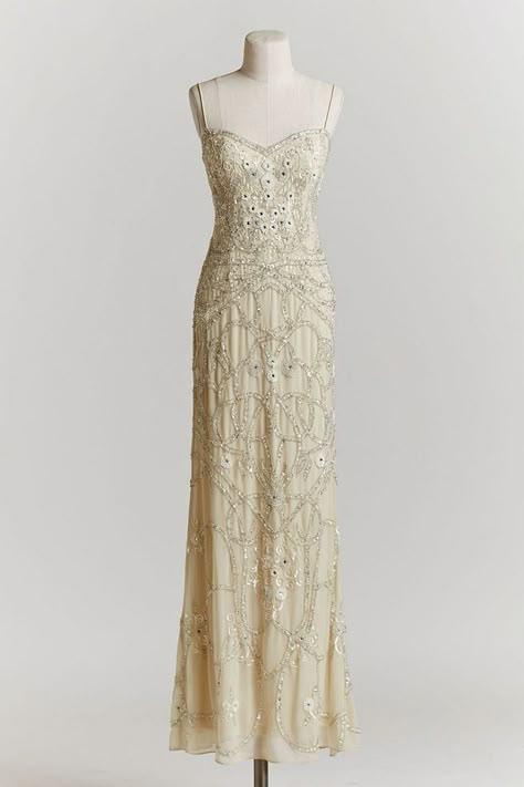 Art Deco Wedding Dress: this sleek, ivory shell features skinny straps and a sequin motif from shoulder to toe. 1920s Style Wedding Dress, Vintage Cream Prom Dress, 1920s Inspired Wedding Dress, Wedding Dresses 1920s Style, Grad Gowns, Romantic Prom Dress, Dresses 1920s Style, Deco Wedding Dress, Art Deco Wedding Dress