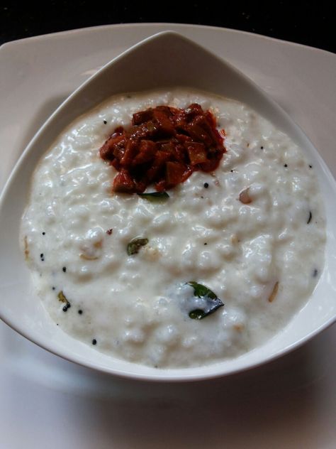 Indian Yogurt/Curd Rice: Curd Rice also known as yogurt rice is a popular dish in southern India. While the easiest preparation for this involves mixing boiled rice with plain yogurt, there are many elaborate ways to prepa… Indian Yogurt, Yogurt Rice, Indian Pickles, Curd Rice, Boiled Rice, Foodie Pics, Plain Yogurt, Biryani, Homemade Recipes