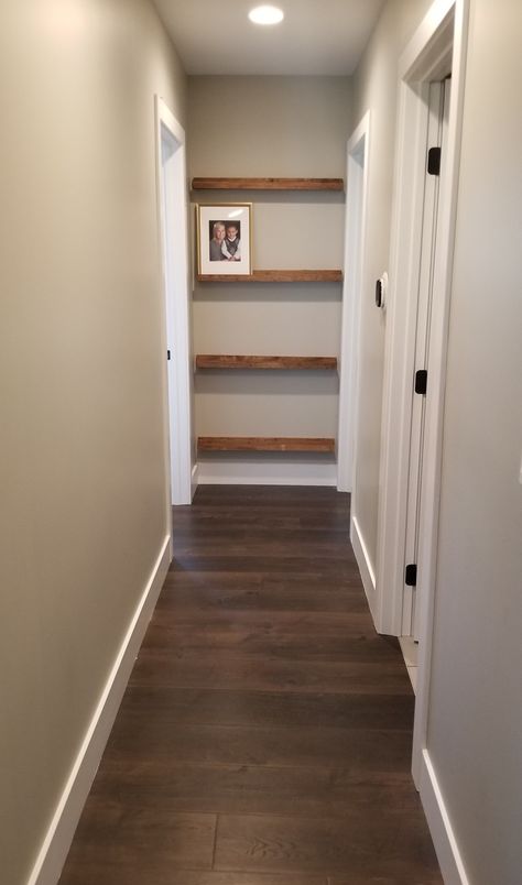 End Of Hall Wall Shelves, Shelves At End Of Hallway, Floating Shelves End Of Hallway, Hallway End Ideas, End Of Hallway Built In Shelves, End Of The Hallway Ideas, End Of Hallway Shelves, End Of Hallway Bookshelf, Hallway Shelf Ideas