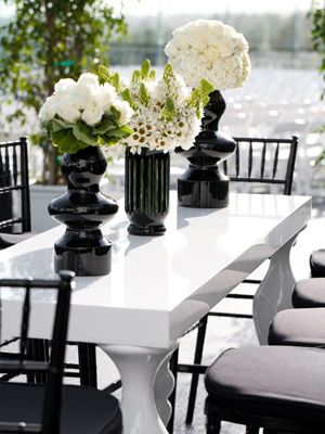 Bold black vases with white flowers; easily do this by spray painting a variety of thrift store vases Wedding Reception White, Wedding Reception Tablescapes, Black Vases, Reception Tablescapes, Art Deco Vases, Black Vase, Black White Wedding, Wedding Table Decorations, Wedding Color Palette