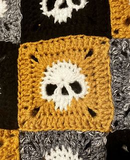 Granny Square Skull Sweater pattern by Sara Rosado Gothic Crochet Granny Square, Crochet Random Granny Square Blanket, Halloween Granny Square Crochet Patterns Free, Skull Motif Crochet Pattern, Skull Granny Square Sweater, Skull Crochet Granny Square Pattern, Knitted Skull Pattern, Pixel Crochet Halloween, Skull Granny Square Blanket