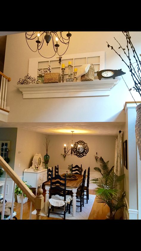 Repurposed door and mantle shelf placed on wall in two-story foyer above dining room. Loving the Farmhouse inspiration. Living Room High Ceilings, Tall Wall Decor, Ledge Decor, Mantle Shelf, Doors Repurposed, Farmhouse Inspiration, Foyer Decor, Foyer Decorating, Foyer Design