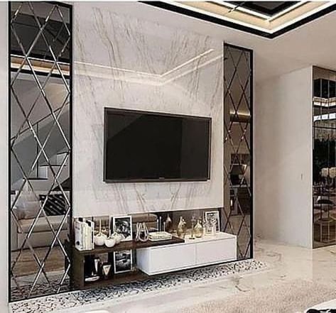 Tv Wall Design Mirror, Tv Wall Mirror Design, Mirror Panel Wall Interior Design Living Room, Tv Unit Design With Mirror, Tv Wall With Mirror Ideas, Tv Unit Mirror Design, Mirror In Tv Unit, Mirrored Tv Wall, Mirror And Tv On Same Wall