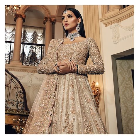 Shaadi Mubarak | Farsh-e-Gul Silver gold Tissue gown with traditional Gangajamni work paired with peach heavy borders dupatta and peach… Bridal Lehenga Design, Anarkali Bridal, Lehenga Design, Walima Dress, Bridal Lehenga Designs, Desi Wedding Dresses, Wedding Lehenga Designs, Asian Bridal Dresses, Asian Wedding Dress