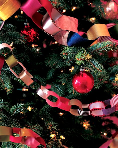 DIY Christmas Tree Garland Ideas to Personalize Your Holiday | Sorry tinsel, your time is over. These festive embellishments are the perfect garland to adorn your Christmas tree. Here's a cost-effective recyclable option: use paper ribbons from gifts to craft this decorative chain-and keep adding for years to come!  #christmas #crafts #marthastewart #DIYdecor Christmas Tree Ribbon Garland, Diy Christmas Tree Garland, Christmas Tree Garland Ideas, Tree Garland Ideas, Diy Christmas Garland, Garland Ideas, Christmas Decor Inspiration, Ribbon On Christmas Tree, Merry Christmas Images