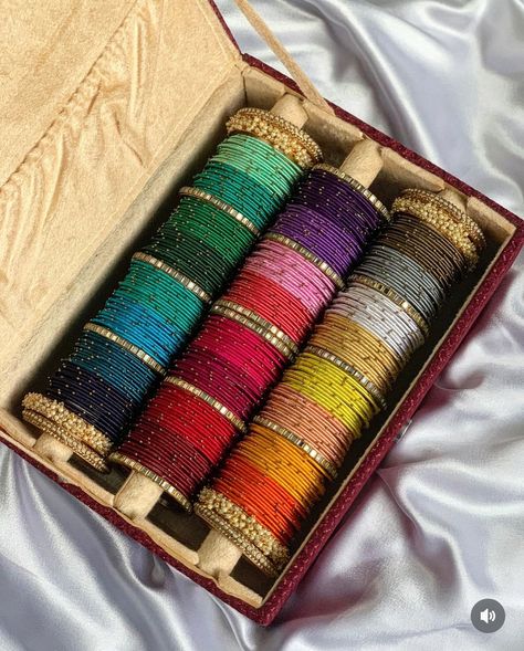 Thread bangles combo box dispatched 💟 Full combo in 1st picture- 1999₹ Box for ₹799 2nd picture combo - 24 colours- 1 dozen each bangles at just ₹1350 Size 2.2 to 2.10 available ✨ -colours may vary in combo boxes -bangle box may have slight imperfections as it is handmade -pls ask for size chart if there is confusion for bangle size. We use global sizes only. No size exchange available . #combobox #banglescombo #diwalibangles #karvachauthspecial #banglesbox #customisedbangles #velvetban... Bangles Aesthetic, Ishq Hai, Latest Gold Ring Designs, Traditional Bangles, Desi Jewelry, Silk Thread Bangles Design, Thread Bangles Design, Braided Bracelet Diy, Bangle Box