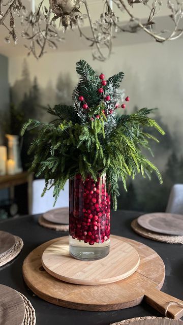 Jodie Kammerer on Instagram: "Comment for links! Who’s getting excited for the holidays? 🙋‍♀️🎄 Comment for links and I can send you the direct Amazon links for: - the pine branches I used - this exact vase! (So versatile!) - these faux Christmas tree candles I used fresh cranberries but you could also use faux. Follow along for more east holiday decorating ideas! 🎄Be sure to follow my Amazon shop (link in bio) 🙋‍♀️ #christmasdecor #easychristmasdiy #christmascenterpiece #christmasdecorati Pine And Cranberry Centerpieces, Centerpiece With Cranberries, Cranberry Vase Centerpiece, Cranberry Decor Christmas, Cranberry Centerpiece Christmas, Cranberry Decorations, Fresh Christmas Centerpieces, Cranberries Decor, Cranberry Centerpiece