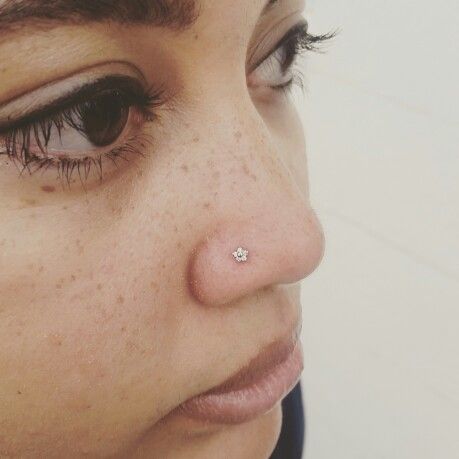 Rose gold flower in a nostril piercing Rose Gold Flower, Nose Piercing, Gold Flowers, Tattoos And Piercings, Piercings, Nose Ring, Tattoos