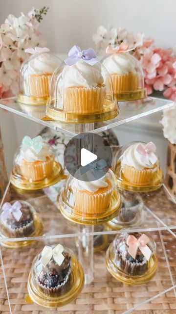 Ashley Temple on Instagram: "Comment CUPCAKE and I’ll send you the mini domes, bows, and acrylic stand! 

These mini Dome cupcakes are super cute adding the bow makes it an extra special touch. I would recommend using the smallest cupcake bites You can find. They are easy to assemble and keep your event on budget! 🎀🧁

Hi, I’m Ashley! I share tons of party favors, gift ideas, event ideas, seasonal decor, hostess tips, and tricks and all of the treasures on Amazon you didn’t know you needed. Please follow my page for more🎀🎀" Cupcake Bridal Shower Ideas, Cupcake Bites, Hostess Tips, Small Cupcakes, Ashley I, Follow My Page, Acrylic Stand, Event Ideas, 60th Birthday