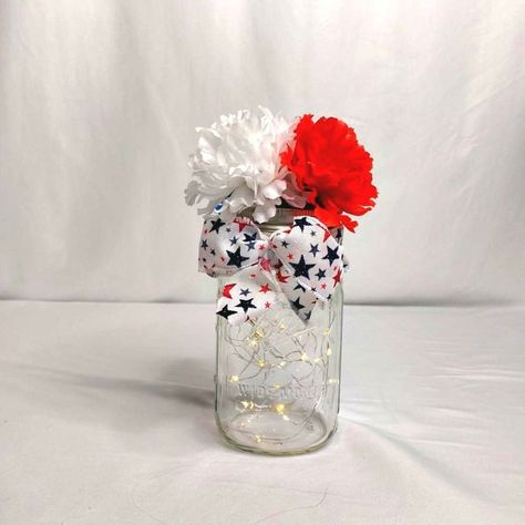 Jars With Lights Inside, Patriotic Flower Arrangements, Mantel Piece, Patriotic Flowers, Bbq Table, Red White And Blue Stars, Ball Mason Jars, How To Make Lanterns, Mason Jar Centerpieces