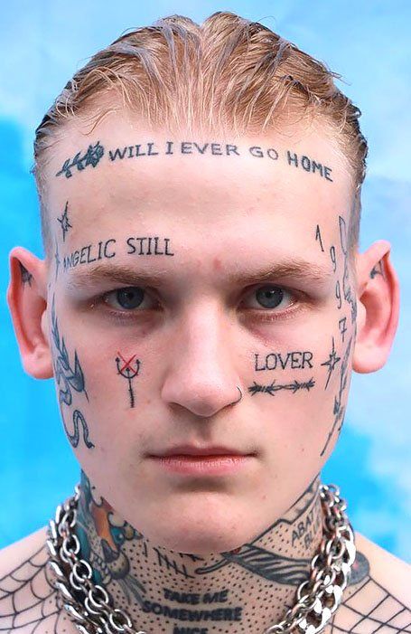 15 Cool Face Tattoos for Ballsy Men in 2021 - The Trend Spotter Cool Face Tattoos, Mens Face Tattoos, Skull Face Tattoo, Small Face Tattoos, Face Tats, Tato Dengan Makna, Men Tattoos, Writing Tattoos, Facial Tattoos