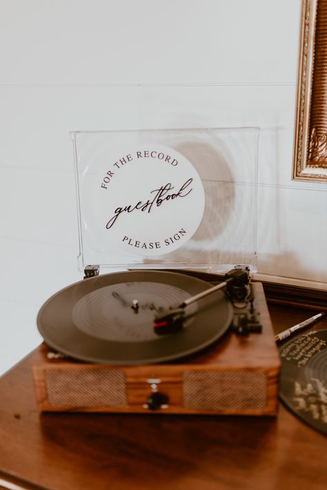 Vinyl record player with a clear top and wooden base sitting on top of a wooden table. Wedding guest book. Record Guest Book Wedding, Vinyl Guest Book, Guest Signing, Wedding Centrepieces, Wedding Photo Inspo, A Night To Remember, Wedding Welcome Sign, Blue Vinyl, Vinyl Signs