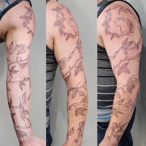 57 Vine Tattoos- A Comprehensive Gallery of Nature’s Artistry - Psycho Tats Arm Vine Tattoo For Men, Wrap Around Vine And Flower Tattoos, Plant Vine Tattoo Arm, Rose Thorn Tattoo Vines, Vine Arm Tattoo Men, Vine Tattoos Forearm, Greek Vine Tattoo, Thorny Vine Tattoo, Vines Tattoo Arm