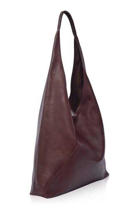 Our timeless handmade wear-everywhere slouchy leather shoulder bag will bring a luxe touch to any ensemble. Featuring an unstructured silhouette, leather wrapped shoulder strap and an embossed logo on the front Sueno shoulder bag will carry all of your essentials with stylish ease.  Style this tote with your favorite p Dark Brown Leather Bag, Soft Leather Tote, Large Leather Bag, Slouchy Bag, Fall Bags, Leather Weekender Bag, Leather Weekender, Vintage Leather Bag, Brown Leather Bag