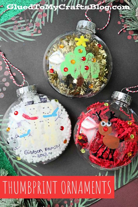 Thumbprint Christmas Ornaments - Kid Craft Christmas Ornament Fingerprint, Handprint Ball Ornaments, Craft Ornaments For Kids Easy Diy, 2nd Grade Christmas Ornament Craft, Ornament Filling Ideas, Christmas Ornaments School, Clear Round Ornaments Diy Kids, Christmas Ornaments For Preschoolers To Make, Thumbprint Ornaments Diy