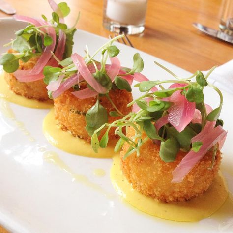 Salt Cod Croquettes w/ yellow roasted pepper aioli, pickled onions, & micro… Croquettes Plating, Salt Cod Croquettes, Crab Arancini, Arancini Fine Dining, Scallop Crudo Michelin, Fine Dining Plating, Authentic Thai Food, Gourmet Food Plating, Light Bites