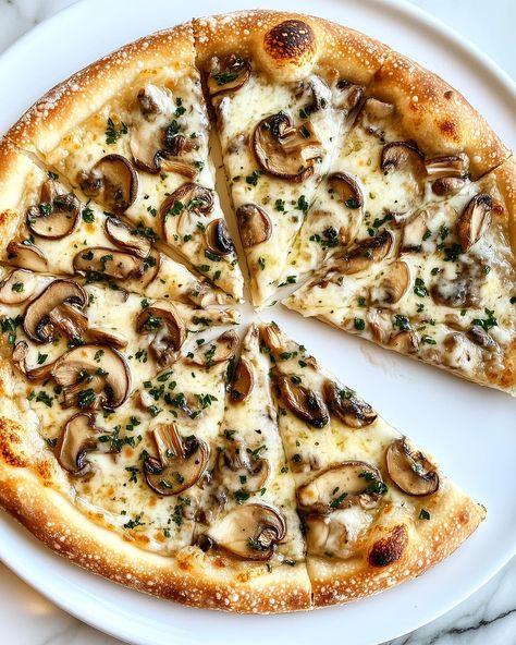 Vegan Mushroom Pizza 🍕🌱 You will definitely want a piz–za this!🤤 Follow @plantiful.palate for more recipes🗒️ Recipe: Ingredients: For the Dough: - 250g plain flour - 150ml warm water - 1 tbsp olive oil - 1 tsp instant yeast - 1/2 tsp salt - 1/2 tsp sugar For the Topping: - 200g mushrooms, thinly sliced - 150g vegan Applewood cheese, sliced - 50g Follow Your Heart vegan Gouda cheese, sliced - 3 tbsp vegan butter - 2 cloves garlic, minced - 1 tbsp fresh parsley, chopped - Salt and pepper, ... Vegetarian Pizzas, Mushroom Pizza Recipes, Pasta Aglio E Olio, Vegetarian Pizza Recipe, Veggie Pizza Recipe, Food Vibes, Sausage Pizza, Mushroom Pizza, Vegan Mushroom