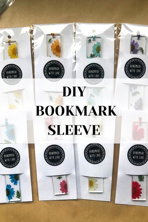 Diy Bookmark Sleeve, How To Package Bookmarks, Bookmark Holder Ideas, Diy Bookmark Packaging, Diy Bookmark Display, How To Pack Bookmarks, Bookmarks Made With Cricut, Diy Resin Bookmarks Tutorial, How To Display Bookmarks For Sale