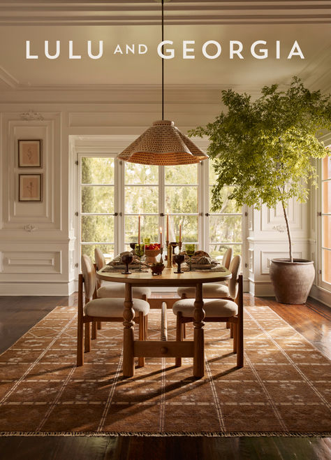 Statement lighting and modern furniture refresh traditional touches and natural textures, bringing a thoughtfully eclectic warmth to this modern tablescape. Shop the dining room look at luluandgeorgia.com. Light Wood Dining Table, Accent Paint, Burled Wood Furniture, Modern Tablescape, Disc Interiors, Paint Inspo, Breakfast Nooks, Dining Room Storage, Lulu And Georgia