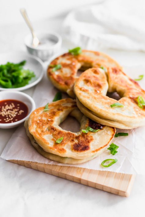 A simple and delicious recipe for the unique, donut-style version of Chinese Green Onion Pancakes, like the ones found commonly in Edmonton.