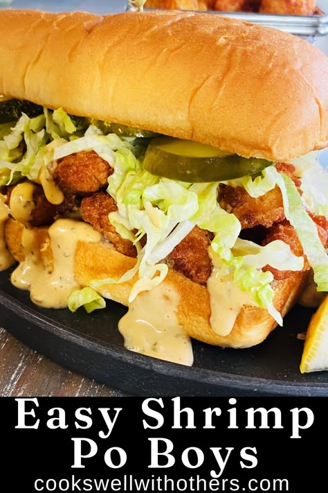 shrimp po boy on a plate Poor Boy Sandwich Recipes, Shrimp Po Boy Sauce, Shrimp Po Boys Recipe, Shrimp Poboys Recipe, Fish Po Boy Sandwich Recipe, Shrimp Sandwich Recipes, Fish Poboy Sandwich, Blackened Shrimp Poboy Sandwich, Poboy Sandwich