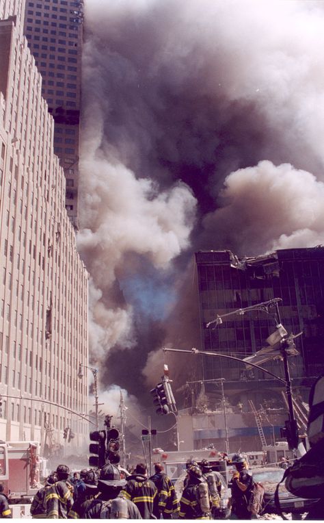 View of west and south side of WTC 7 with white smoke billowing from WTC 6 and WTC 7 on 11 SEP 2001.  EXIF info, Scanned Monday, ‎May ‎19, ‎2003, ‏‎11:06:54 AM Twin Towers Collapse, World Trade Center Pictures, 343 Firefighters, Air Photo, The Pentagon, Ground Zero, We Will Never Forget, Trade Centre, Twin Towers