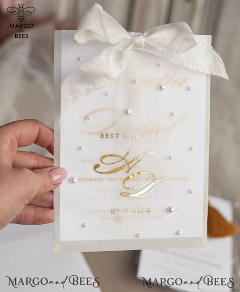 Are you planning a summer wedding and looking for a classic and elegant invitation suite to set the tone for your special day? Look no further than our stunning vellum etui with pearls wedding invitation suite. This invitation suite is the epitome of timeless sophistication, perfect for a summer wedding filled with romance and elegance. The vellum etui adds a touch of luxury and elegance, creating an air of anticipation for your guests. The suite is adorned with delicate pearls, adding a touch o Gorgeous Wedding Invitations, Elegant Wedding Invitations Luxury, White And Gold Wedding Invitations, Princess Wedding Invitations, Wedding Invites Elegant, Pearl Invitations, Fancy Wedding Invitations, Pearl Wedding Invitations, Wedding Invitations Elegant